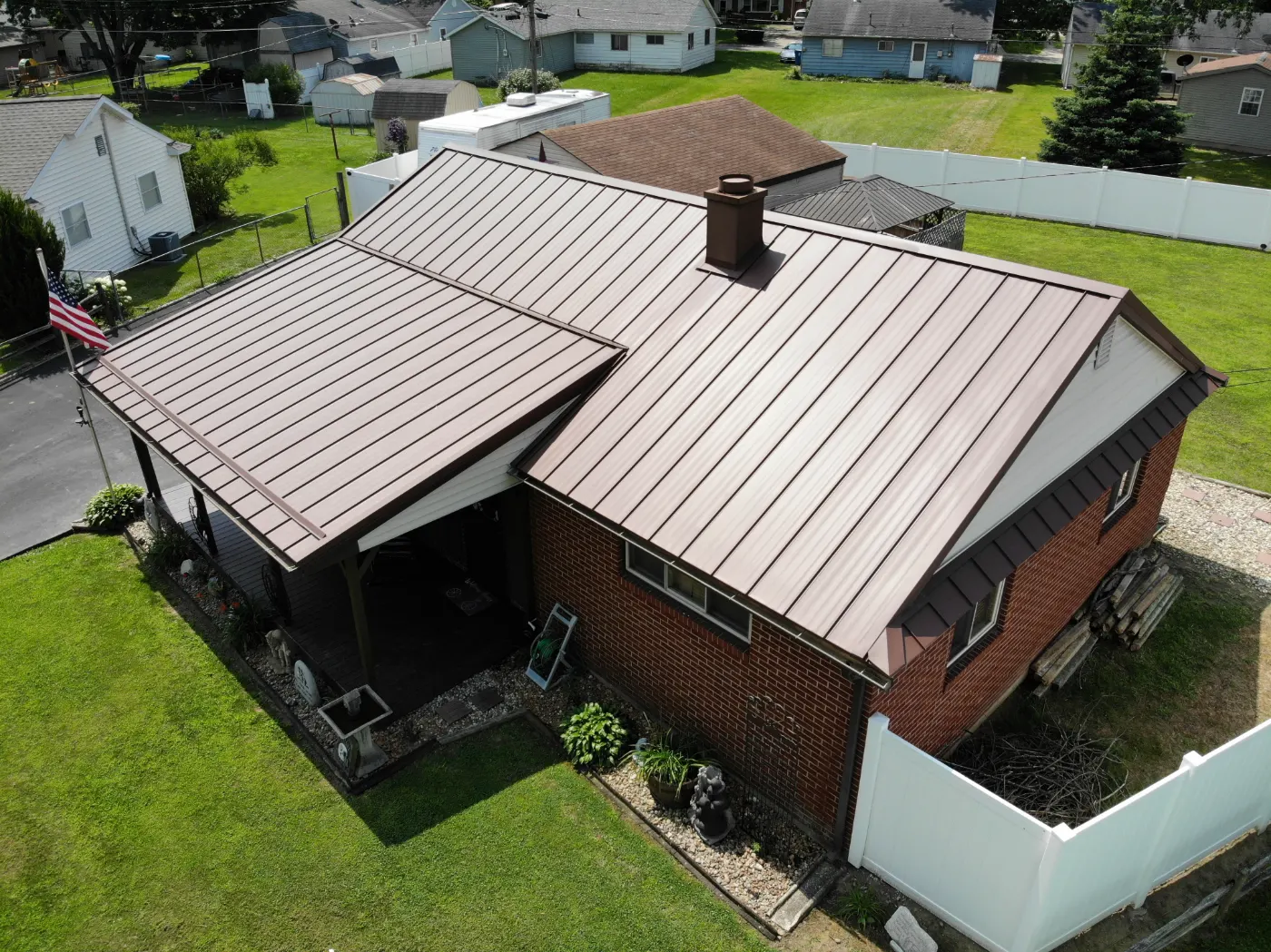 Tarping and dry-in on a Honey Creek commercial roof